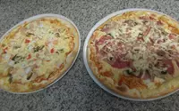 Pizza zeevruchten & pizza paesena